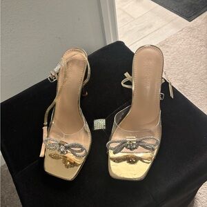 Wild Diva Metallic Gold Heeled Sandals with Clear Straps and Rhinestone Bow